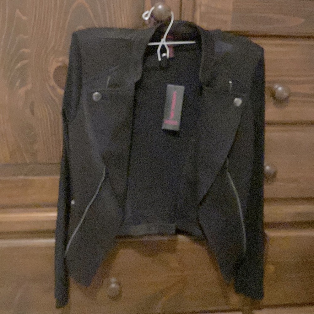 Bought it and never wore it brand new with tags I purchased at Macy’s